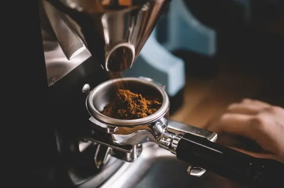 Freshly ground coffee in an espresso portafilter