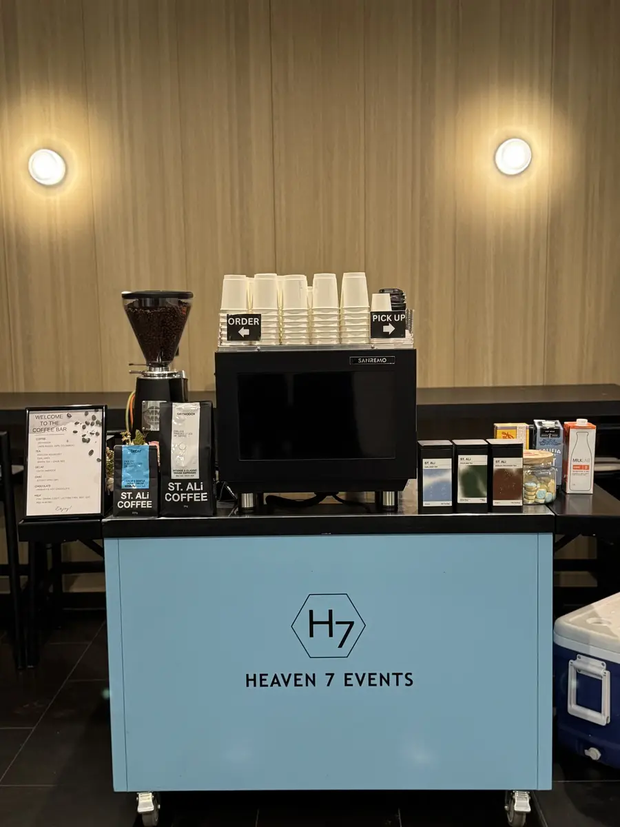 Heaven 7 Events coffee cart with espresso machine and takeaway cups