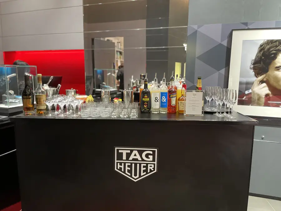 TAG Heuer branded mobile bar with spirits and glassware