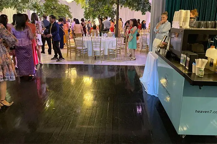 Heaven 7 coffee cart beside the dance floor at a wedding reception