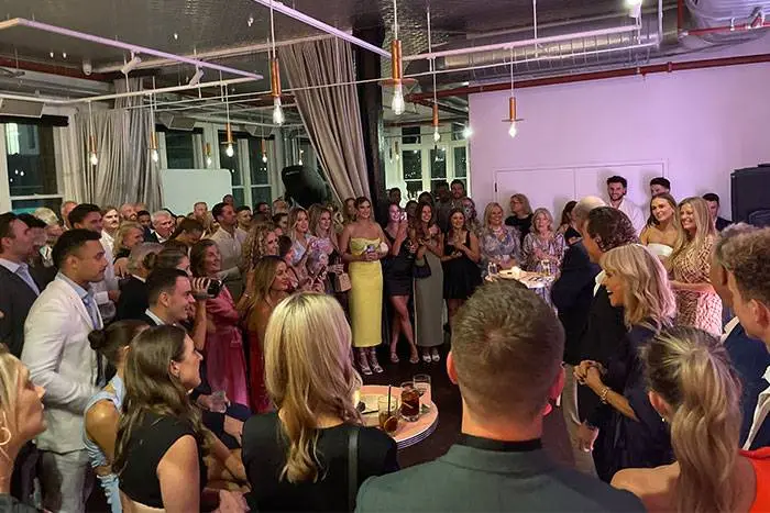 Guests gathered for a celebration at a Melbourne engagement party