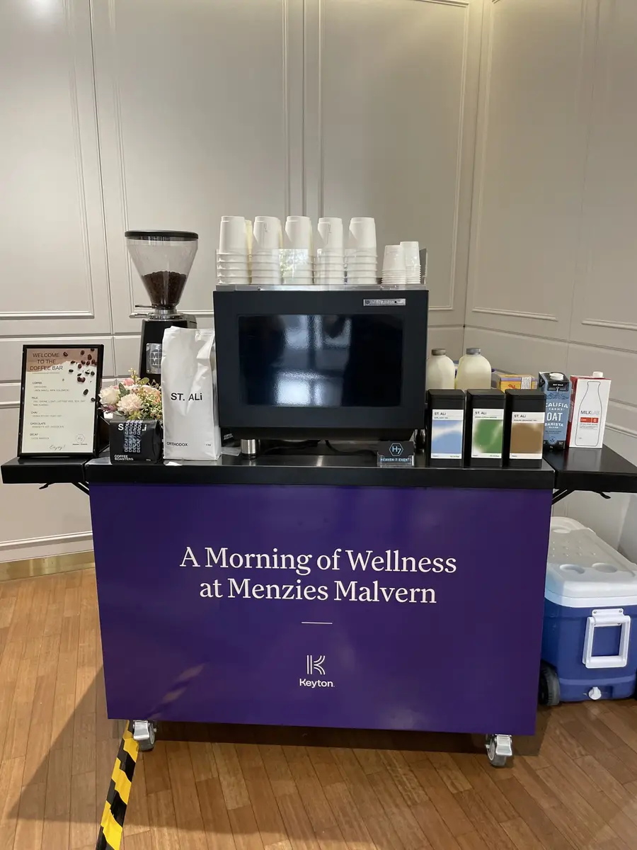 Branded Heaven 7 Events coffee cart serving ST. ALi coffee at a corporate wellness morning